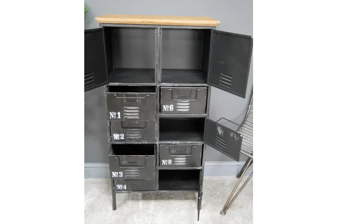 Industrial metal storage cabinet with numbered black drawers and open compartments