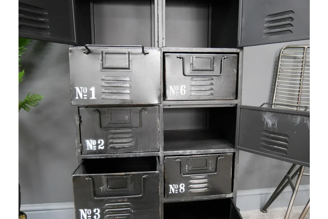 Industrial metal storage drawers with numbered fronts in a matte black finish