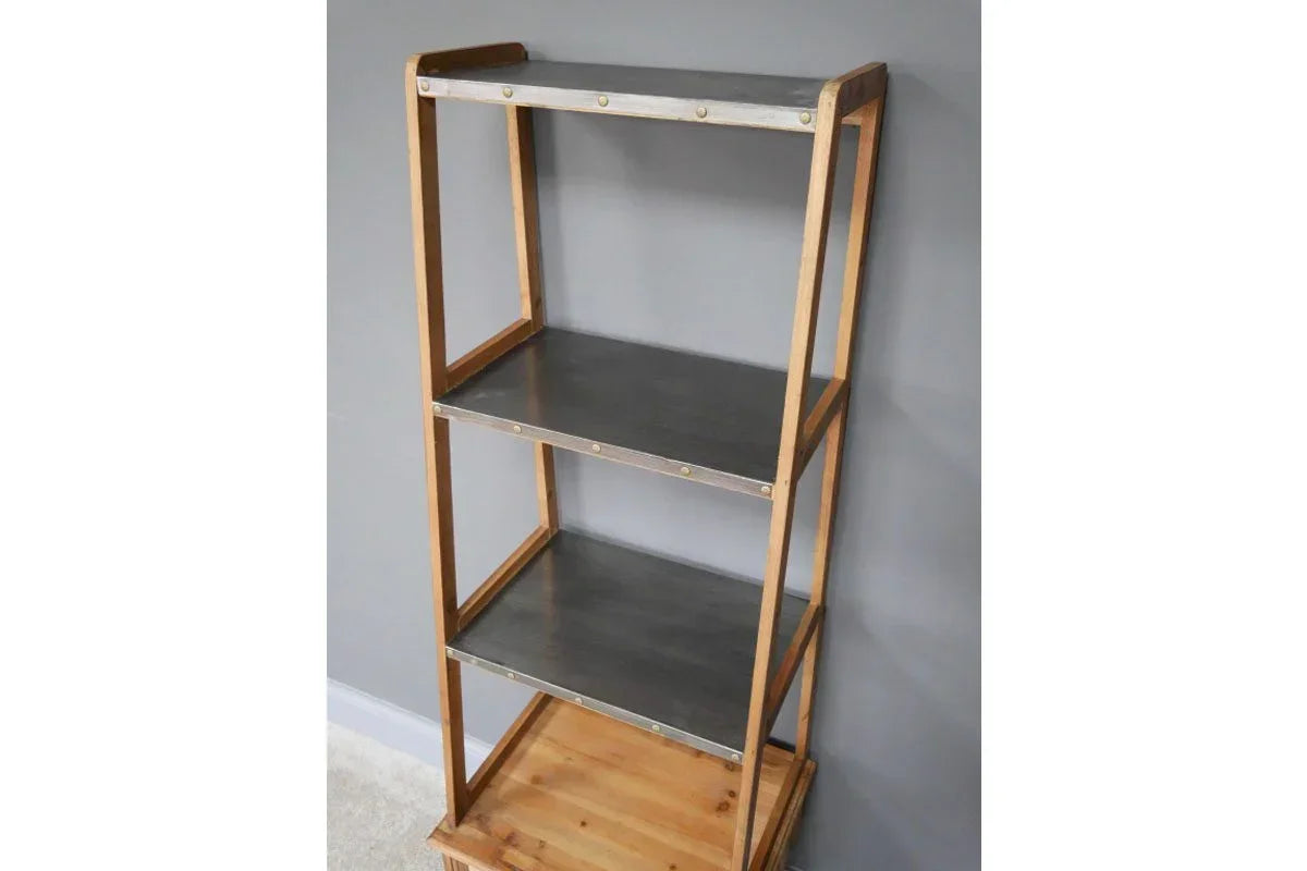 Industrial shelving unit with metal shelves and wooden frame against grey wall