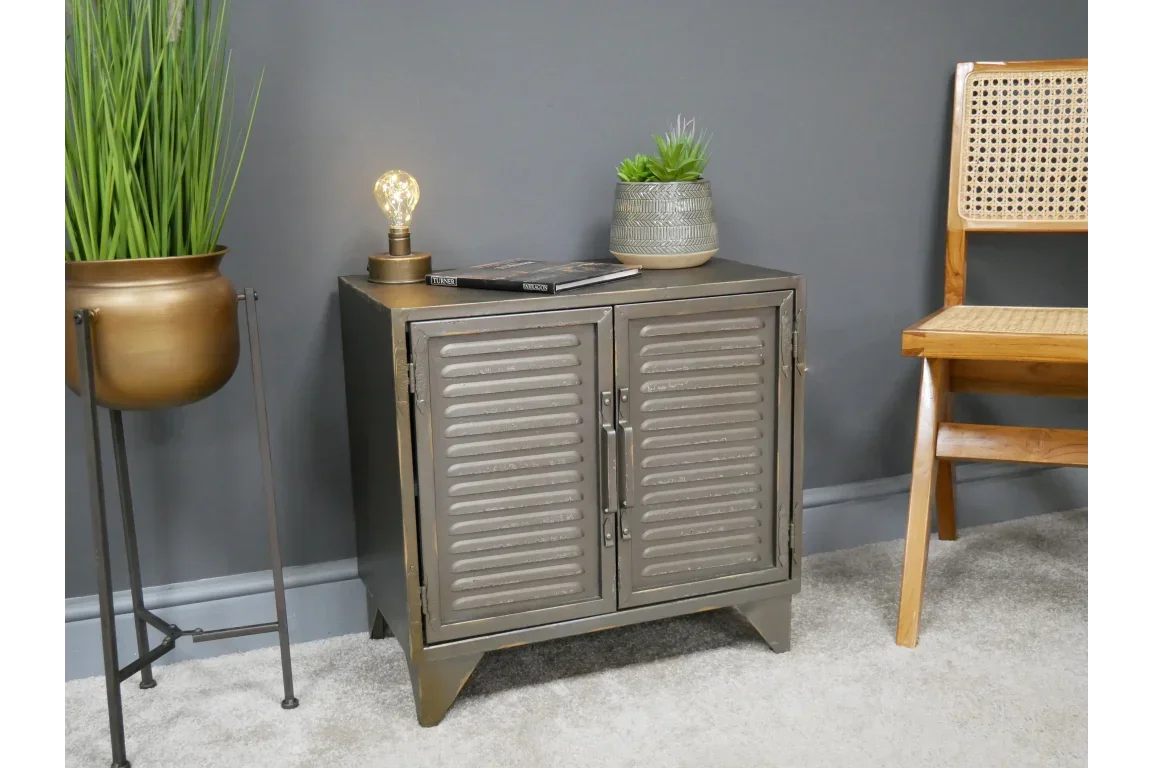 Industrial metal storage cabinet with double doors in modern living room setting