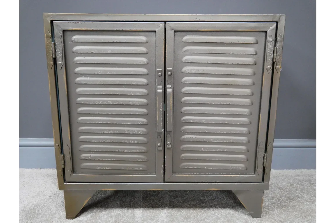 Grey metal storage cabinet with two louvered doors and industrial style legs