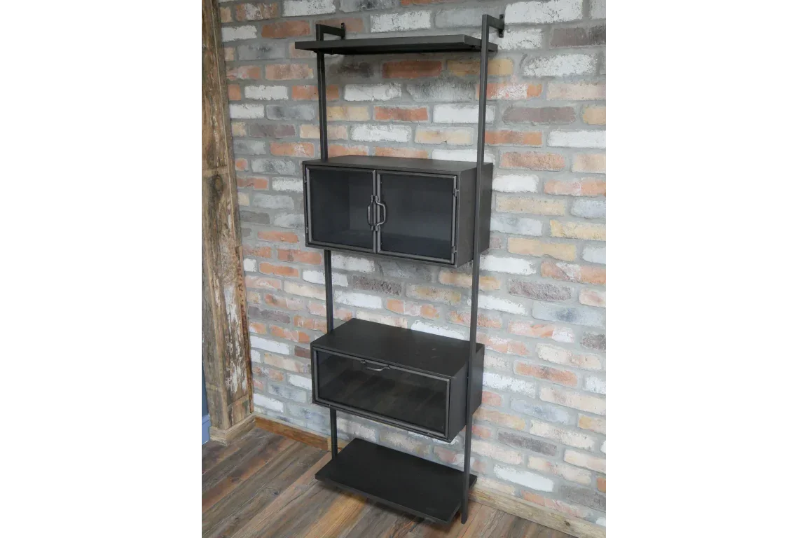 Black metal shelving unit with cabinets and shelves against exposed brick wall