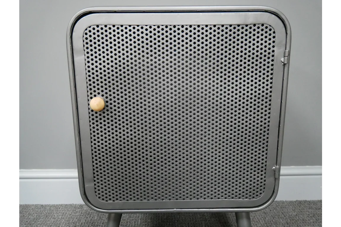 Metal mesh side table with round wooden handle and angled legs on grey carpet