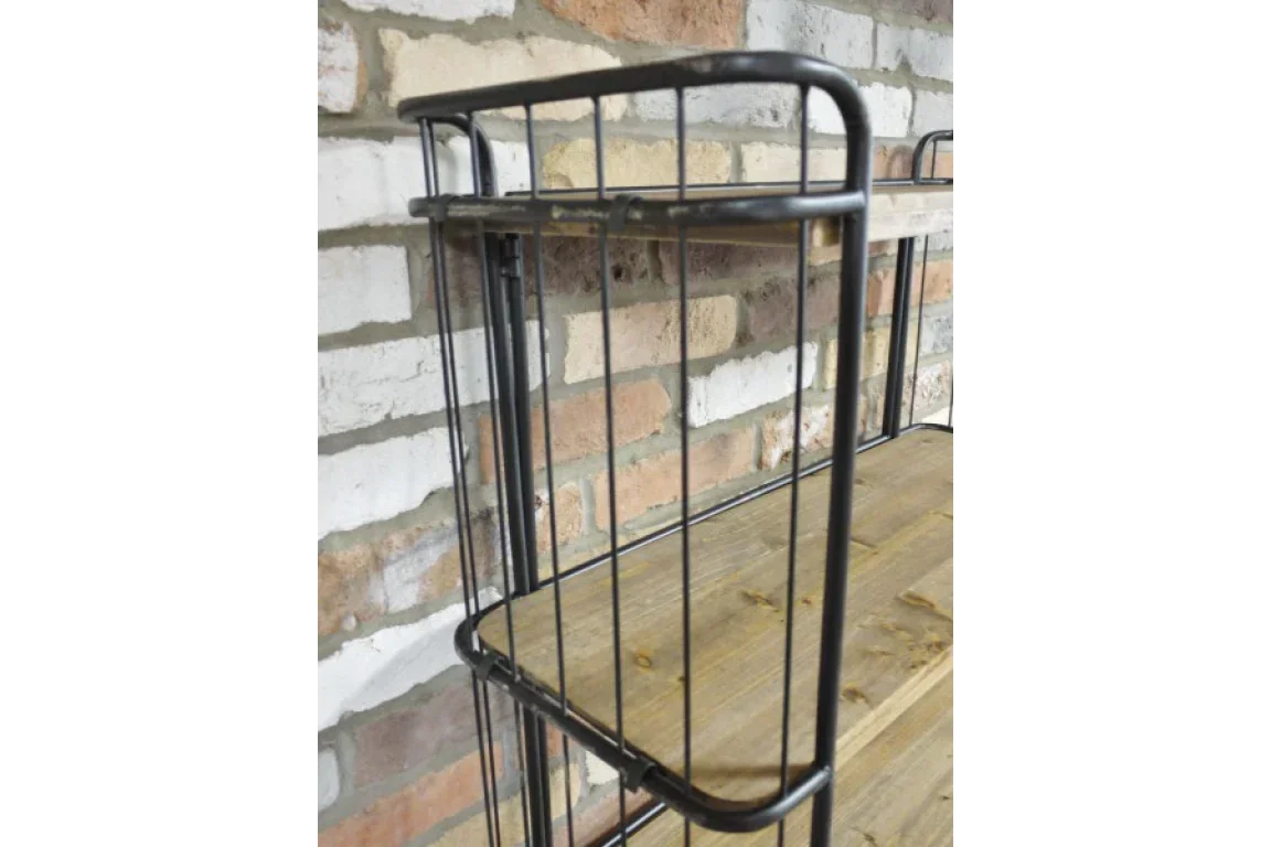 Metal frame shelving unit with wooden shelves against exposed brick wall