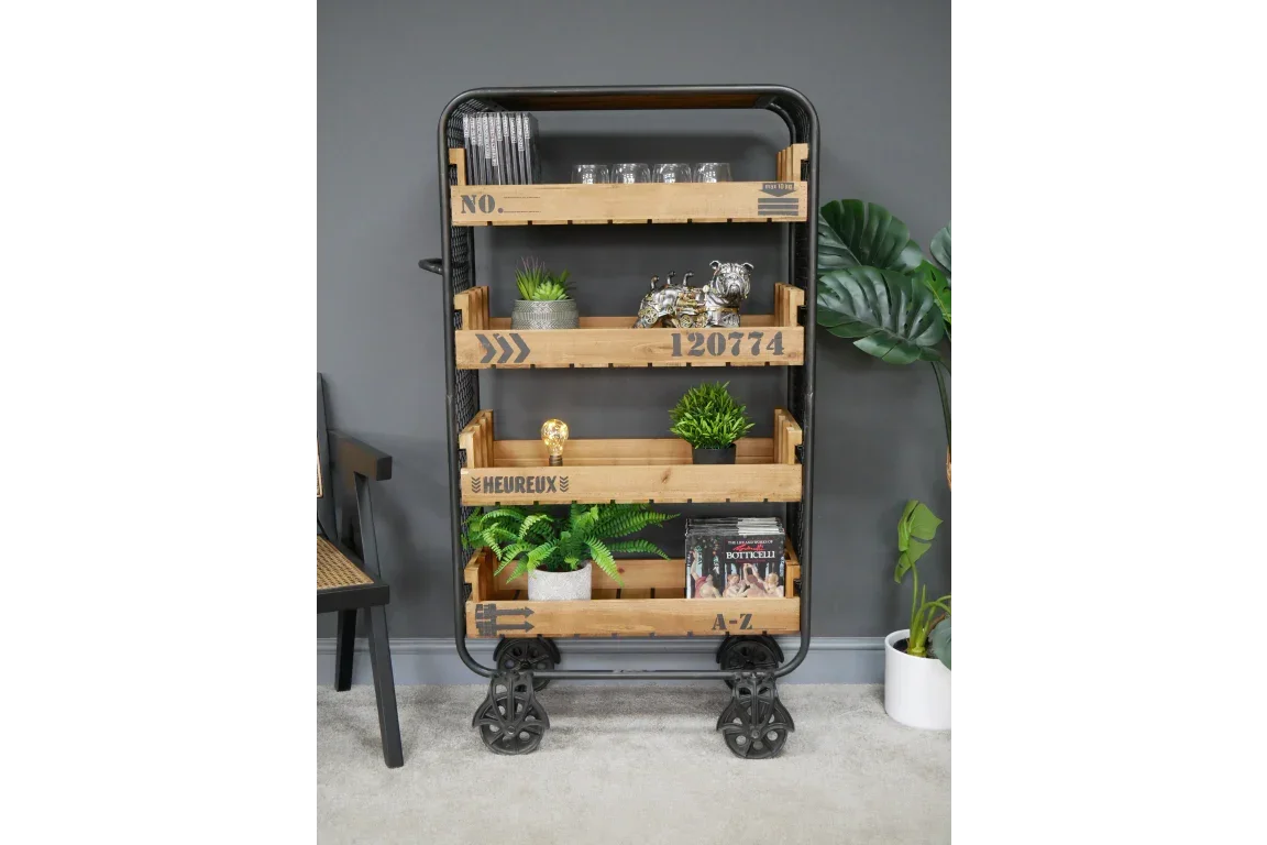 Industrial wooden storage trolley with metal frame, four open shelves, and decorative items