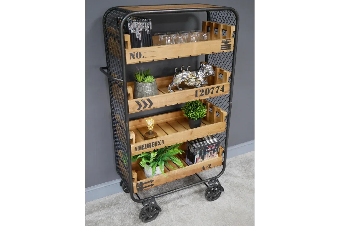 Industrial style storage trolley with wooden shelves and metal frame, decorated with plants