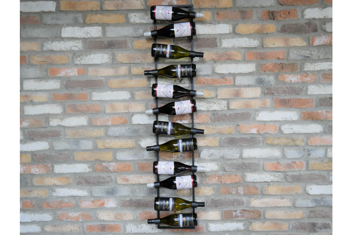Black metal vertical wine bottle holder mounted on a multicolored brick wall, holding alternating bottles horizontally.