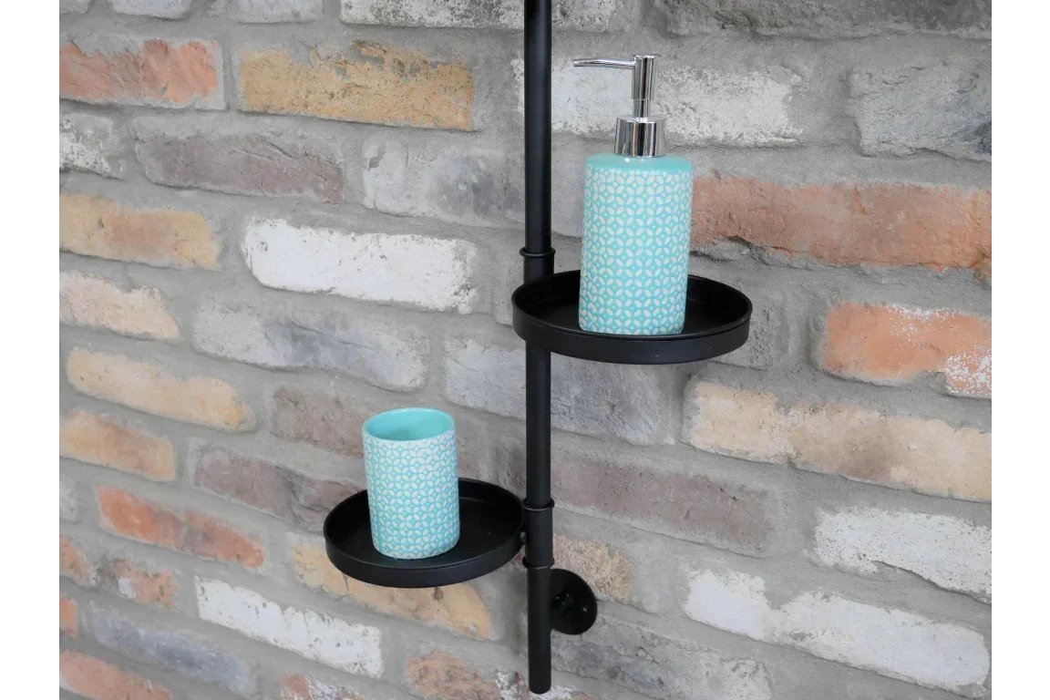 Black wall-mounted bathroom shelf holding blue patterned soap dispenser and tumbler