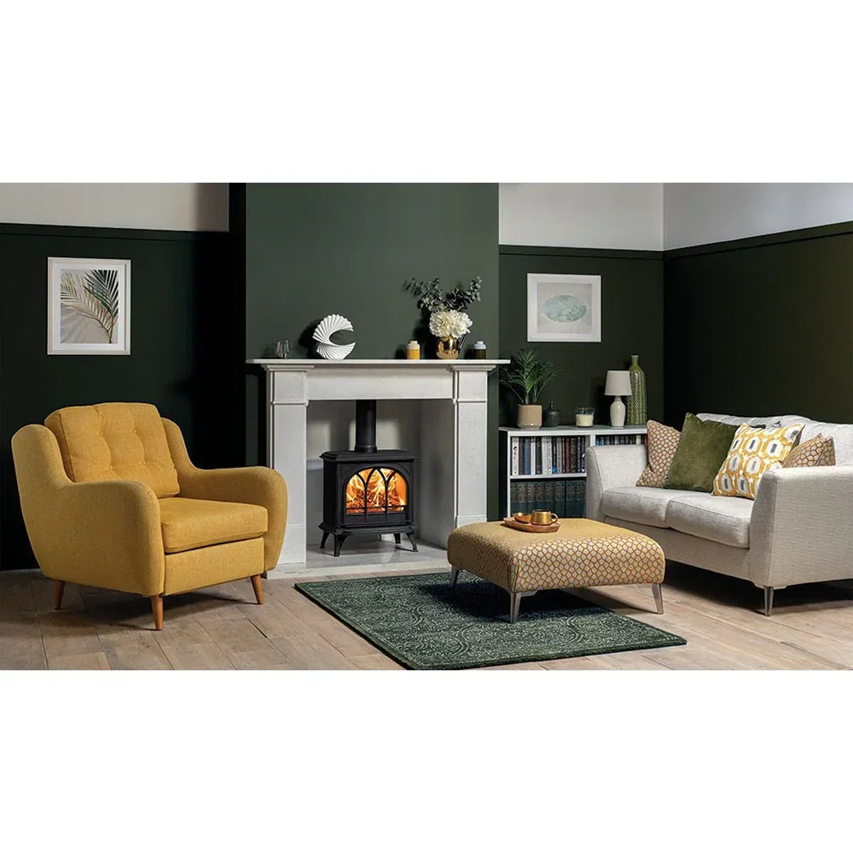 Yellow armchair, patterned ottoman, and cream sofa in modern living room with fireplace