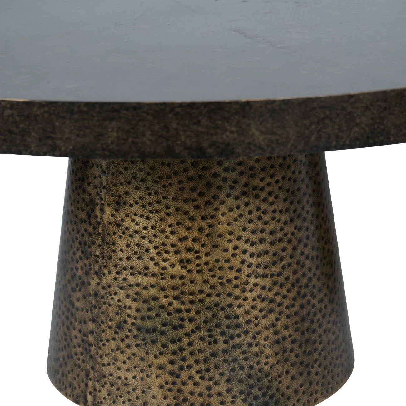 Dark tabletop with textured antique gold base detail.