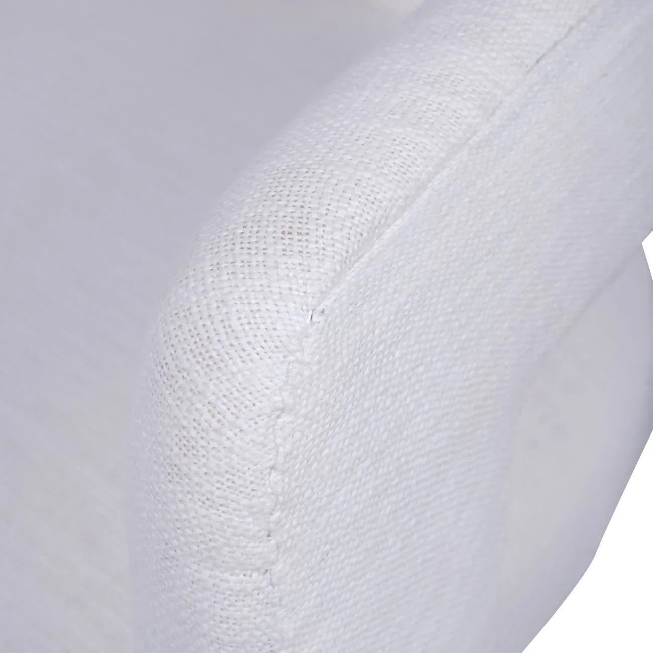 Ivory chair fabric detail showing slub texture and stitching.