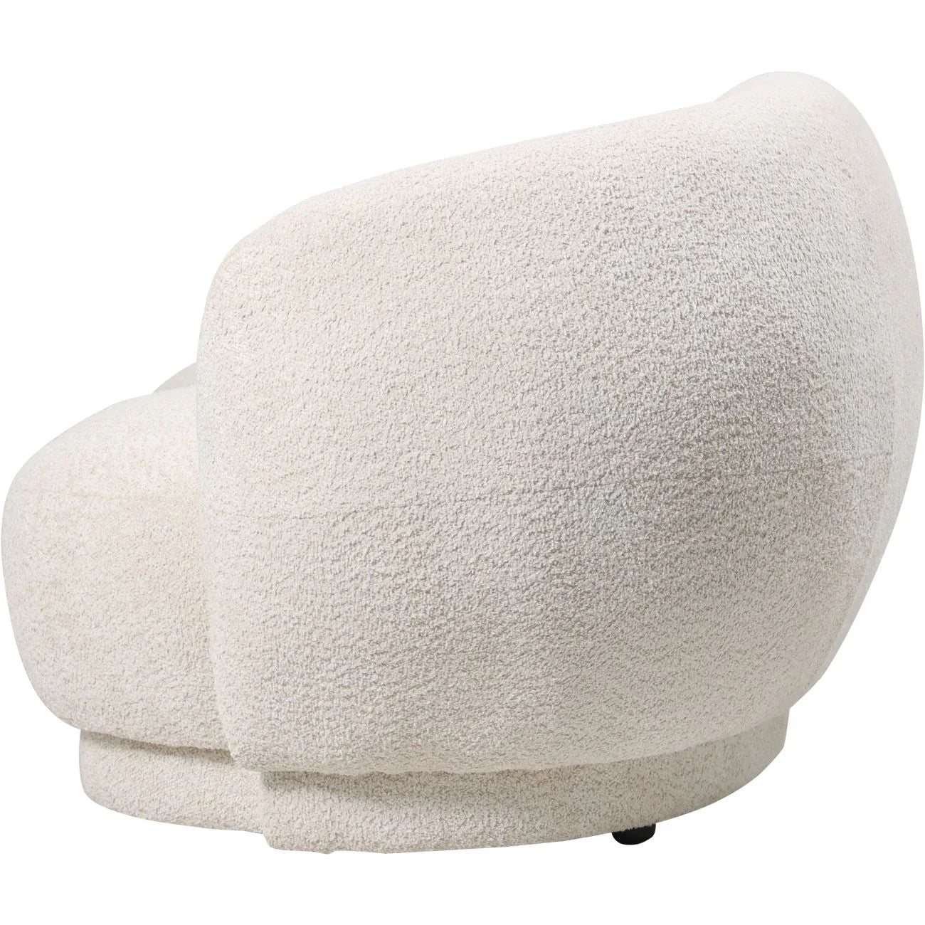 Cream sofa showcasing curved back and textured upholstery.