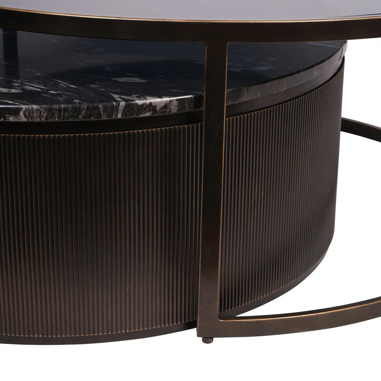 Black nesting table with ribbed texture and marble top detail.