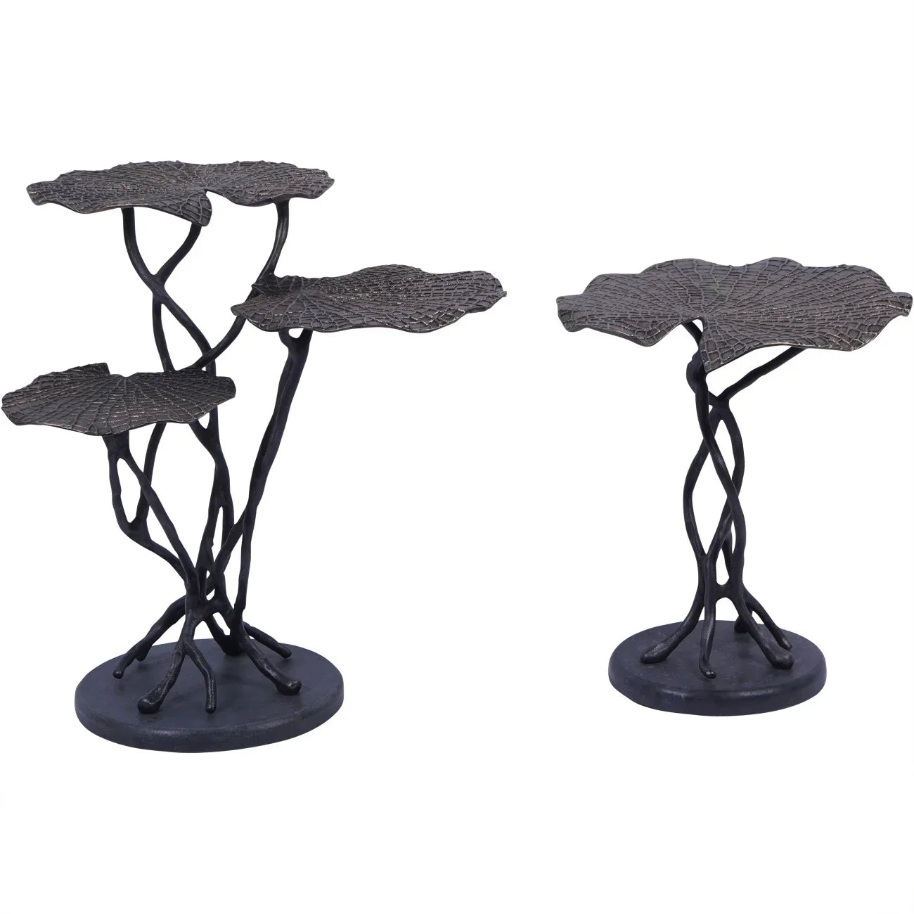 Two dark cast aluminium tables with leaf-shaped tops and twisted stems.