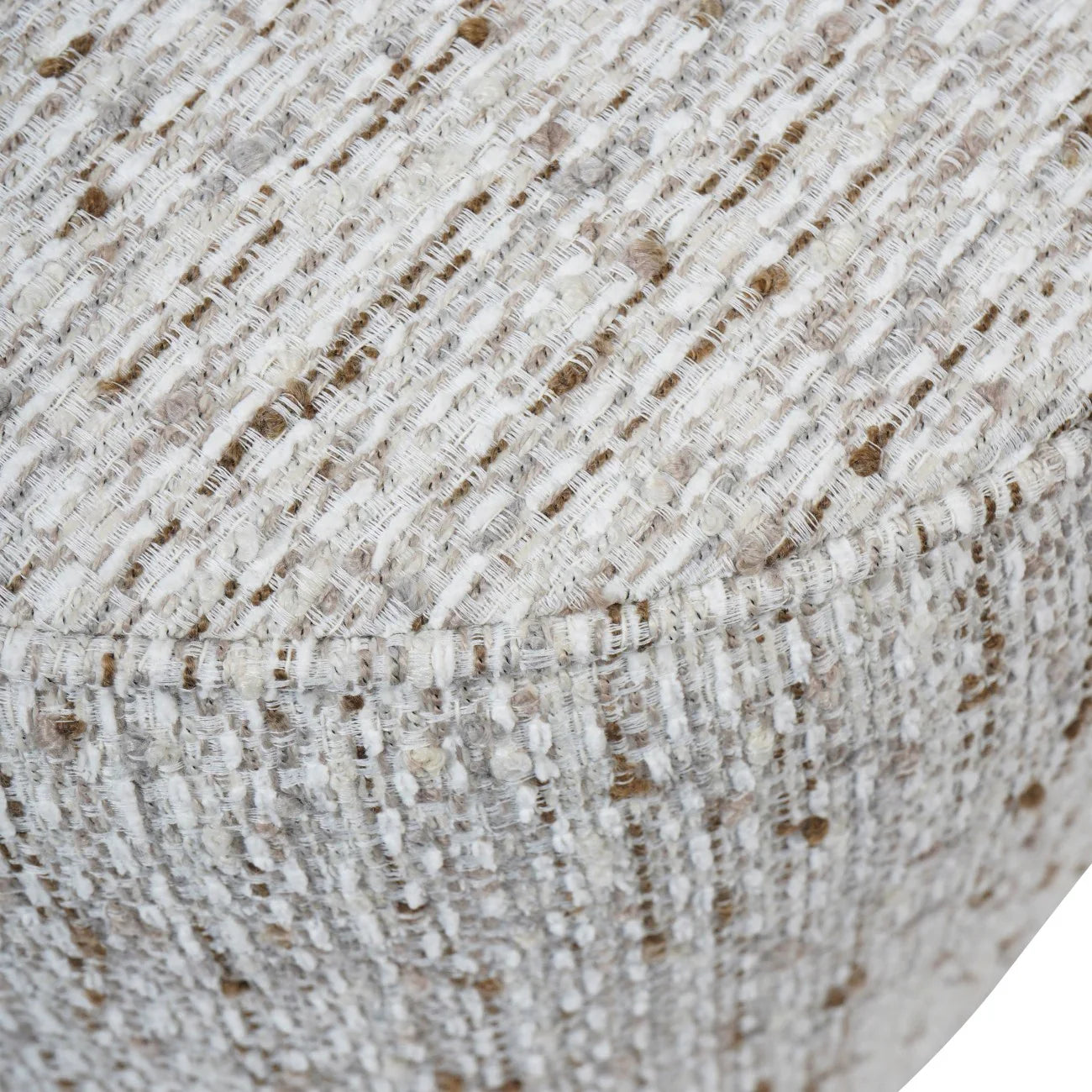 Natural slub fabric with textured weave detail on chair surface.