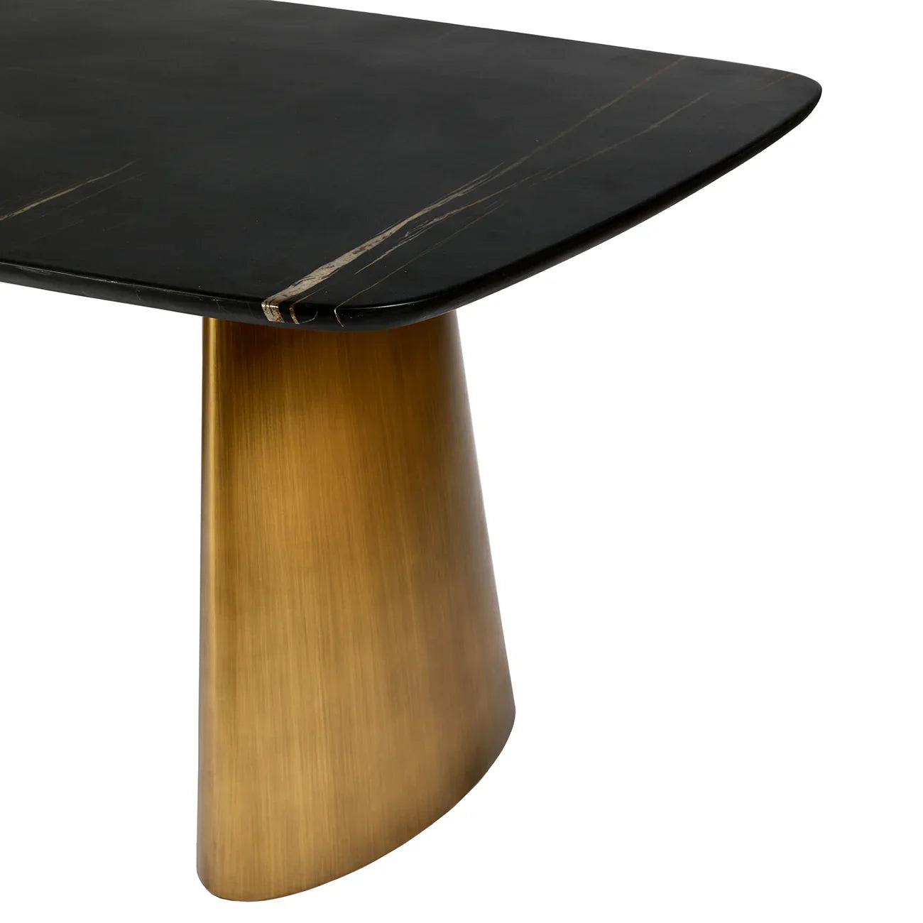 Black marble table corner with brass leg detail.