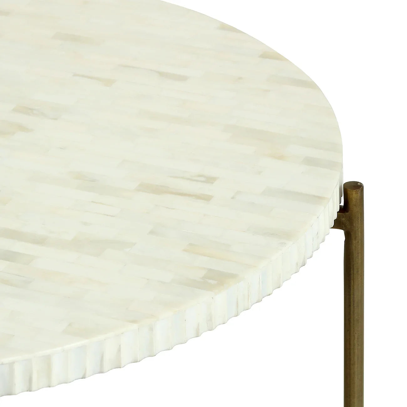 Round table with ivory inlay and brass legs detail.