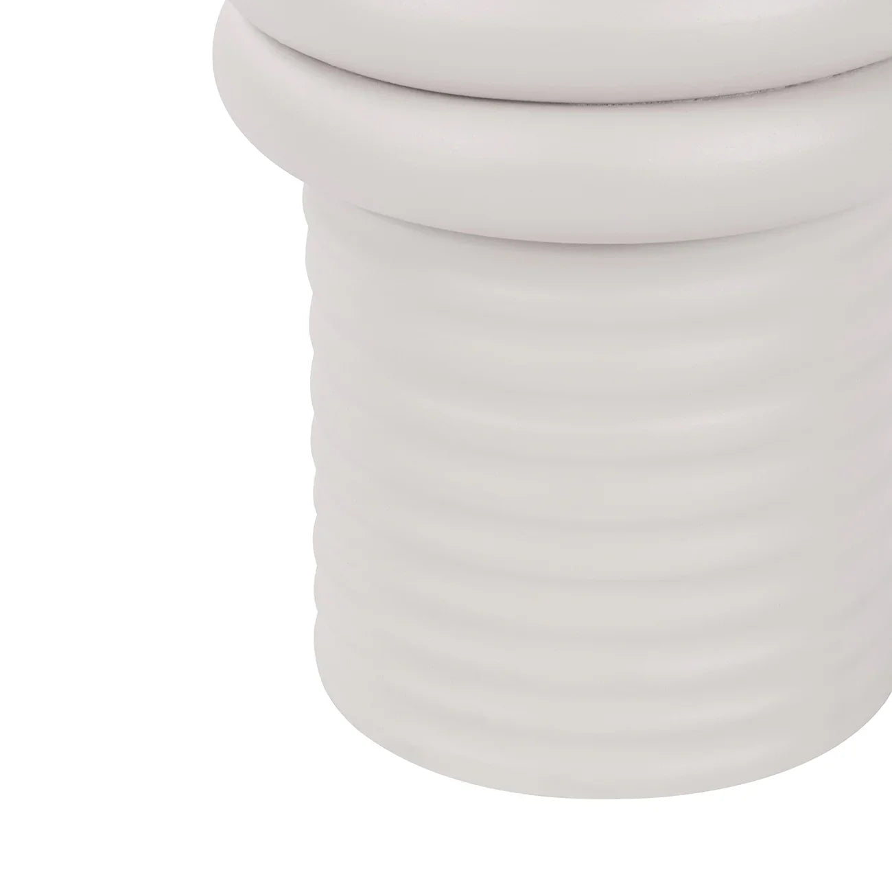White ribbed base of a side table with smooth curves