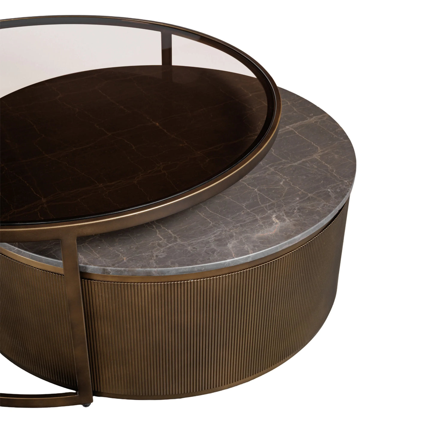 Bronze nesting tables with marble and glass tops, showcasing elegant textures.