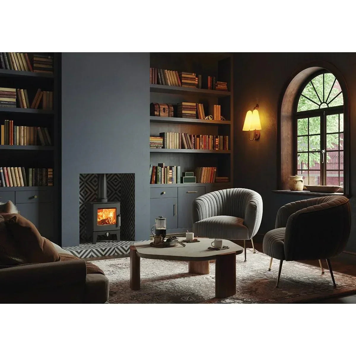 Contemporary living room furniture set with armchairs, coffee table, and wood burning stove