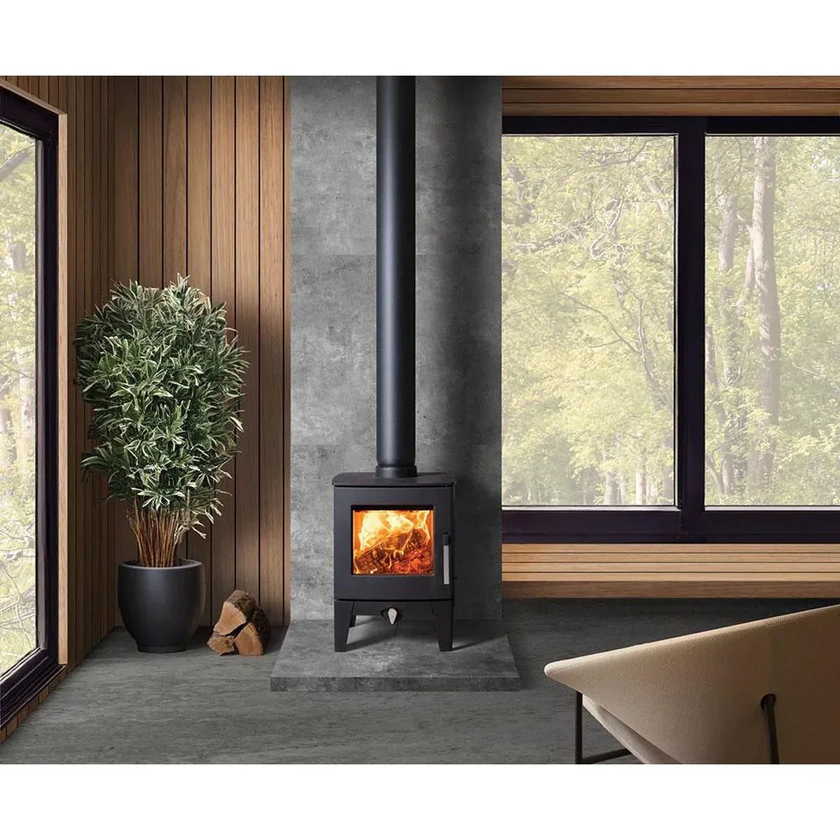 Modern wood burning stove with black chimney in contemporary living room with wood panel walls