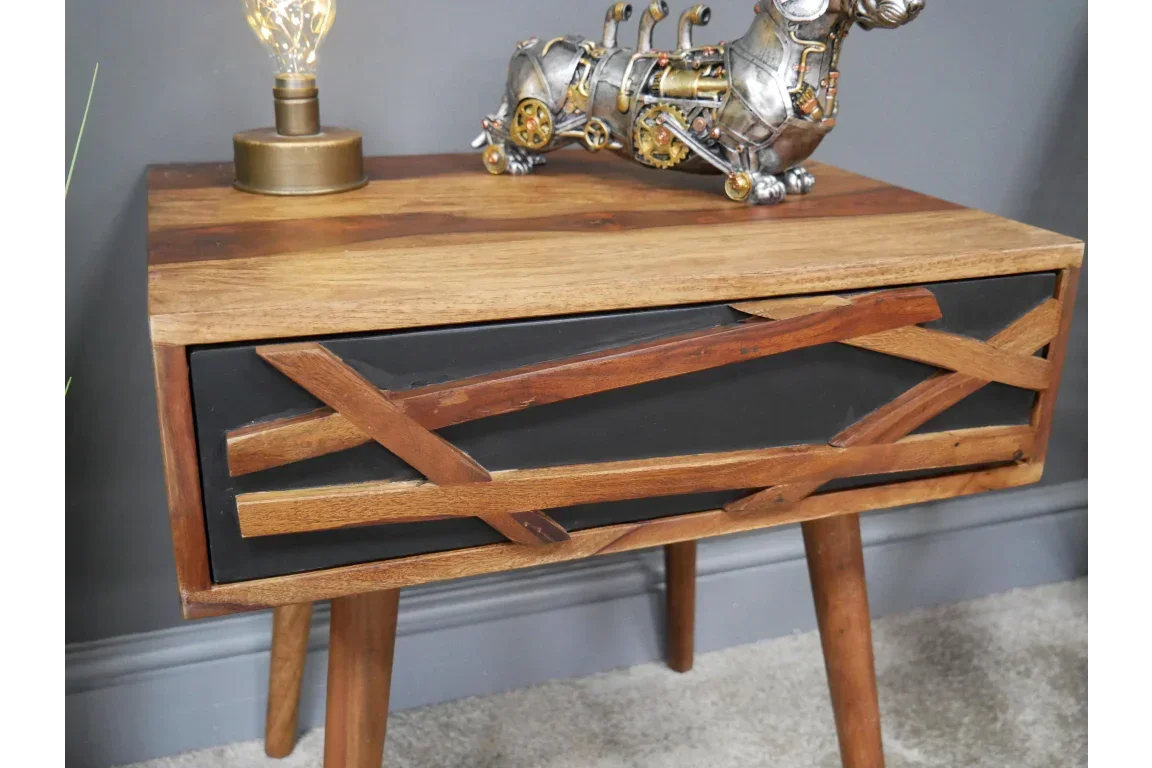 Wooden bedside table with geometric drawer design and mid century legs