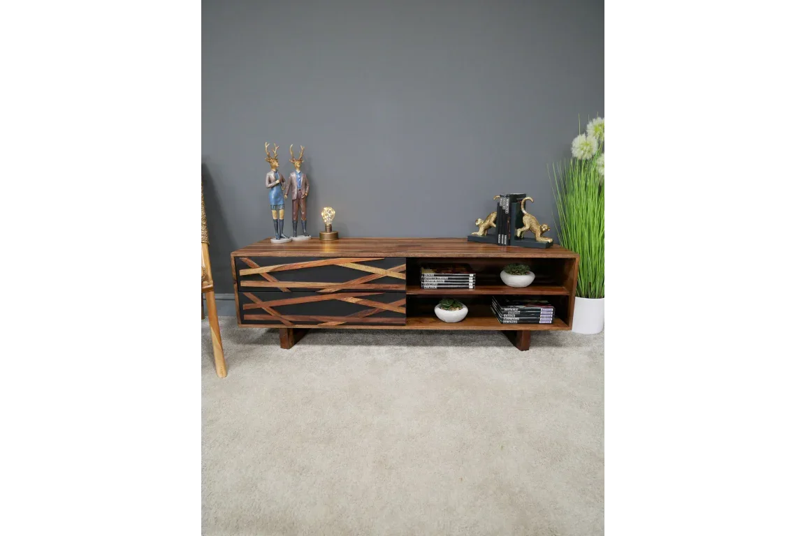 Modern wooden TV unit with geometric design, open shelves, decorative items, and books