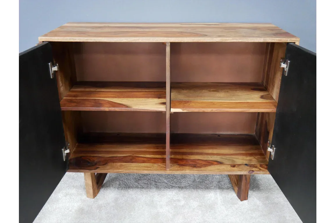Solid wood sideboard with open double doors and interior shelving on carpeted floor
