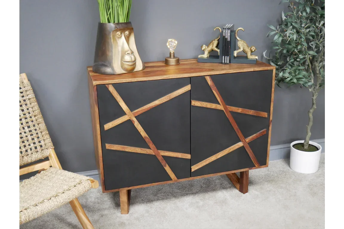 Modern sideboard with black doors and geometric wood accents in a living room setting