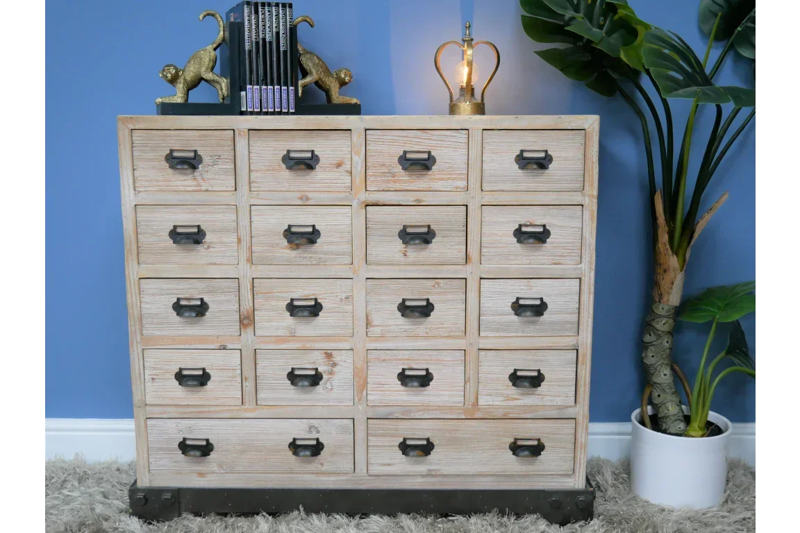 Vintage wooden chest of drawers with 20 compartments and metal handles, styled in living room