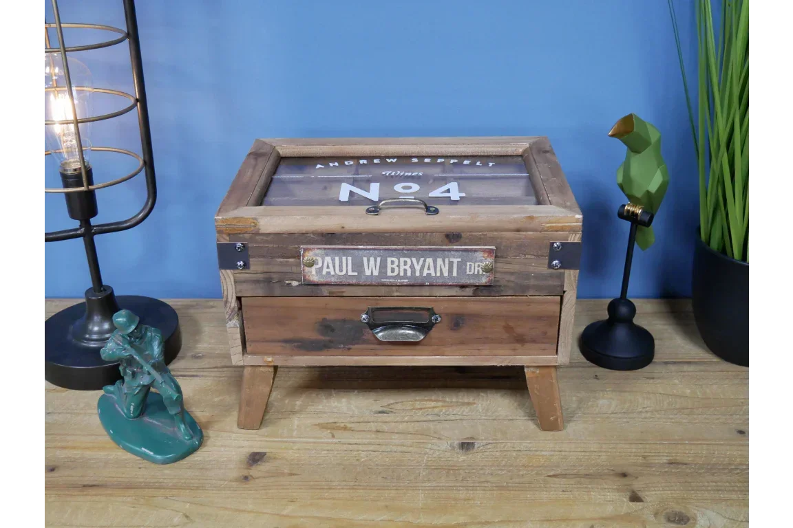 Rustic wooden storage box with vintage metal handle on tabletop