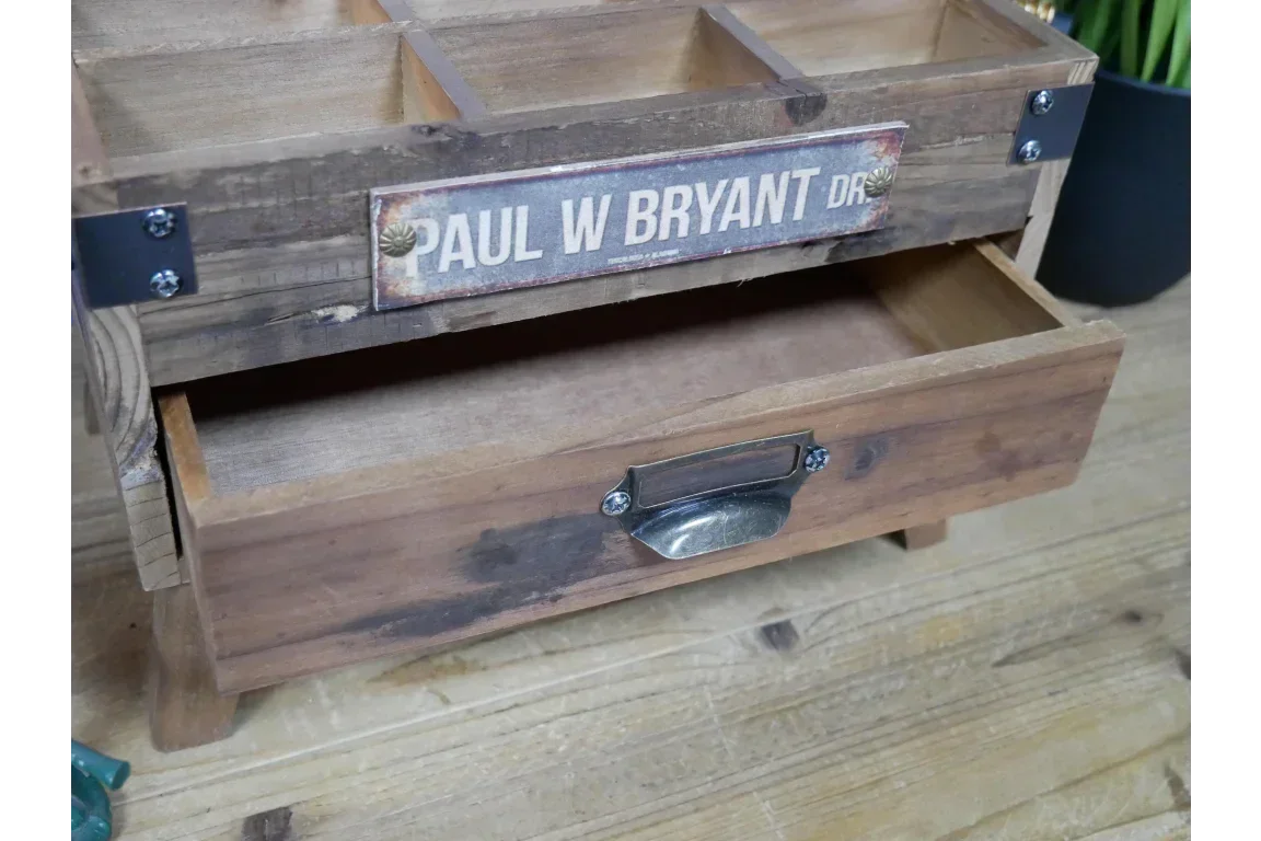 Rustic wooden storage organizer with open drawer and metal handle on wood surface
