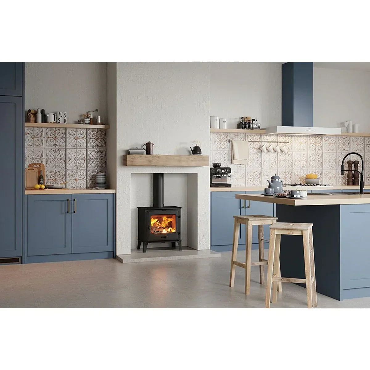 Modern kitchen with blue cabinets, patterned tile backsplash and wood burning stove