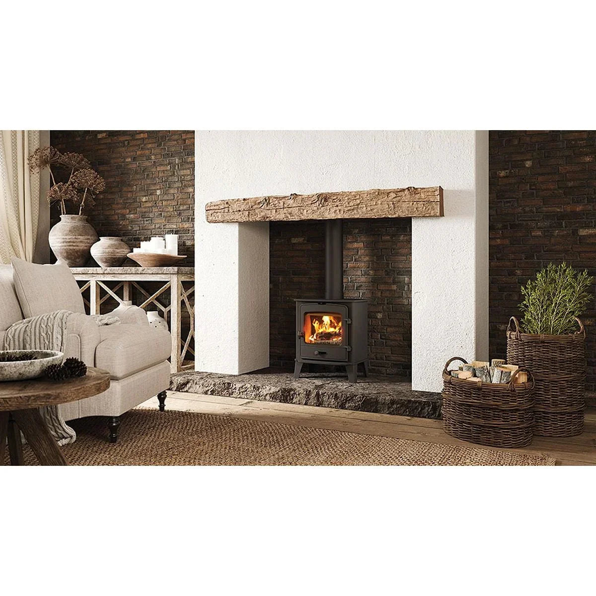 Black wood burning stove with flames in rustic living room setting, wicker baskets beside