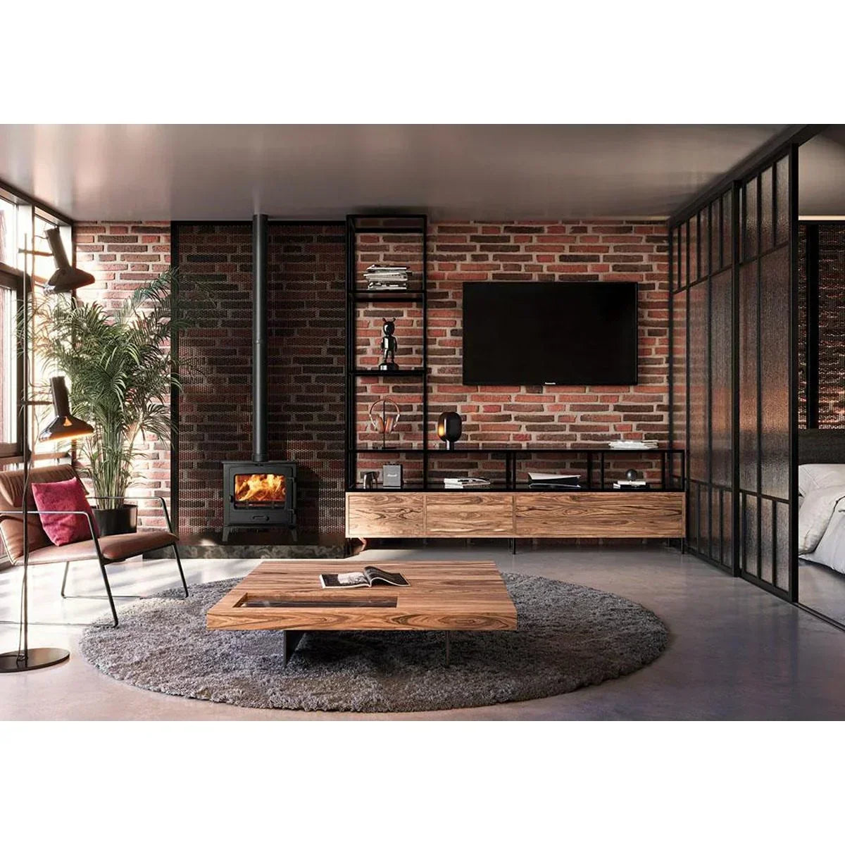 Modern living room with wood coffee table, entertainment unit, and exposed brick wall