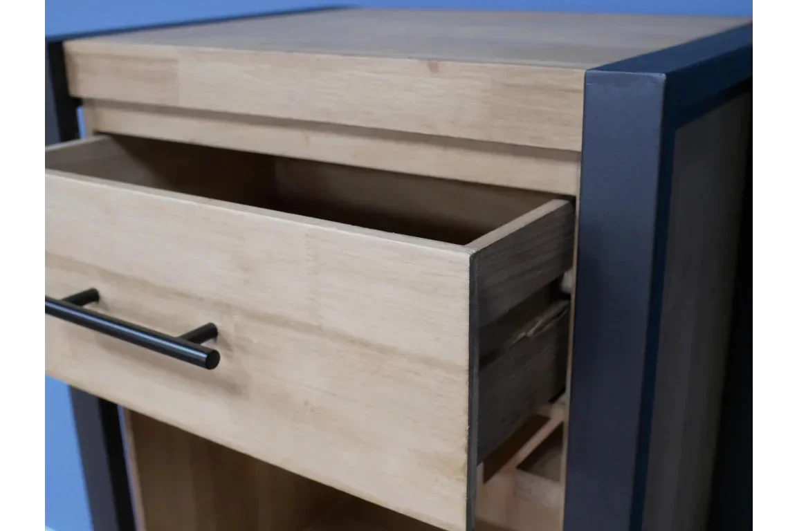 Light wood cabinet drawer with metal handle partially open, grey frame detail visible
