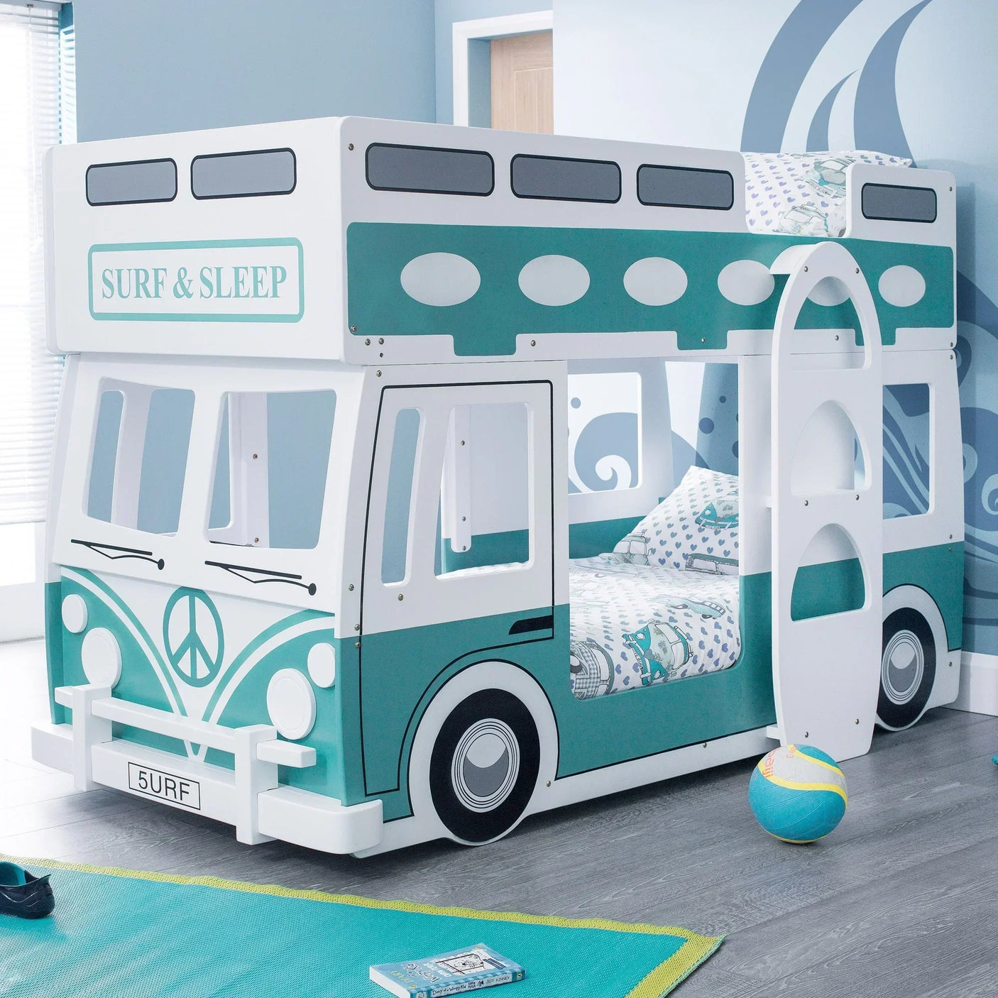Kids camper van bunk bed in teal and white with surfboard ladder and bedding set