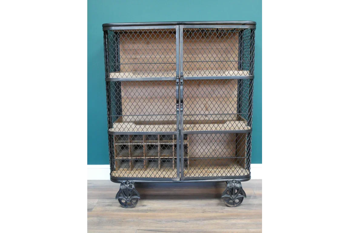 Industrial sideboard with mesh metal doors, wooden shelves, and storage compartments on castor wheels