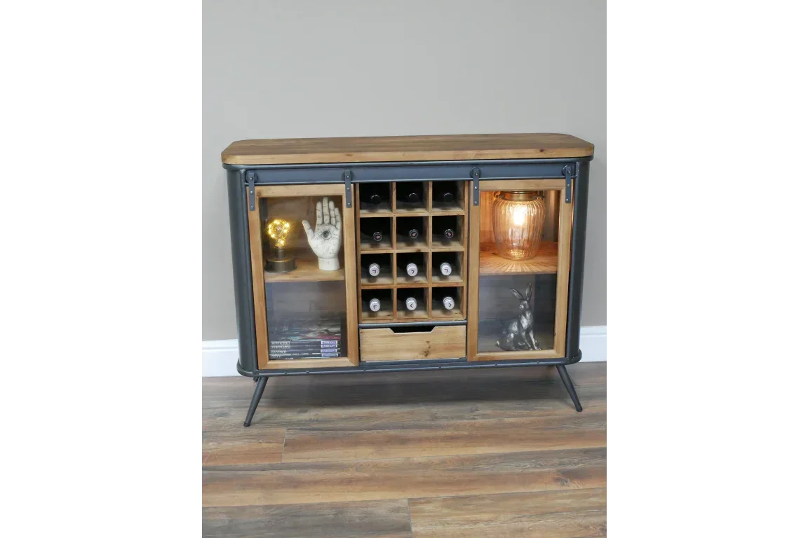 Industrial style wooden sideboard with glass doors and central wine rack on wooden floor