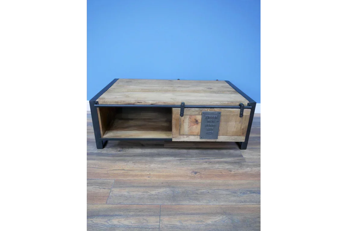 Industrial coffee table with sliding barn door, open storage shelf and metal accents