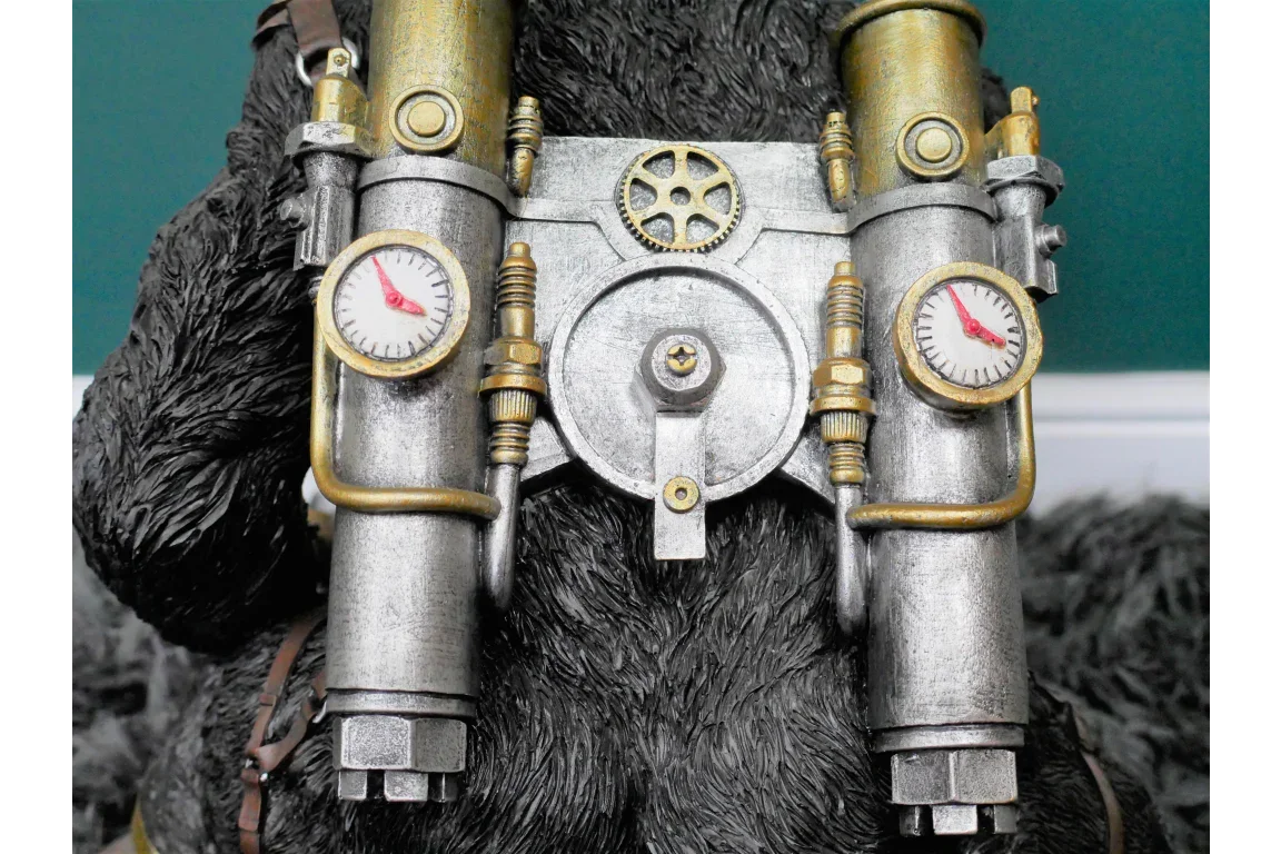 steampunk metal backpack with dual pressure gauges and gold accents on fur texture background