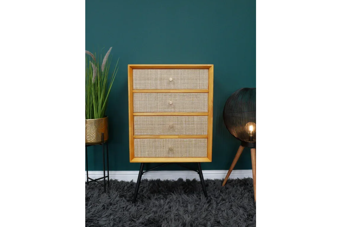 Rattan chest of drawers with wooden frame and black legs on grey rug