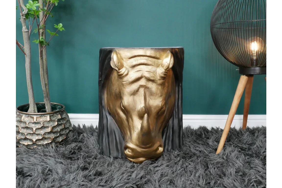 Gold horse head side table with black base on grey shaggy rug