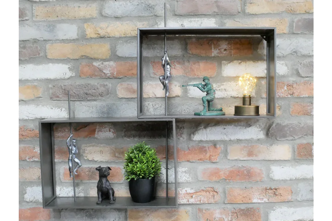 industrial wall shelves with metal monkey ornaments, toy soldier figure, potted plant, and bulb lamp
