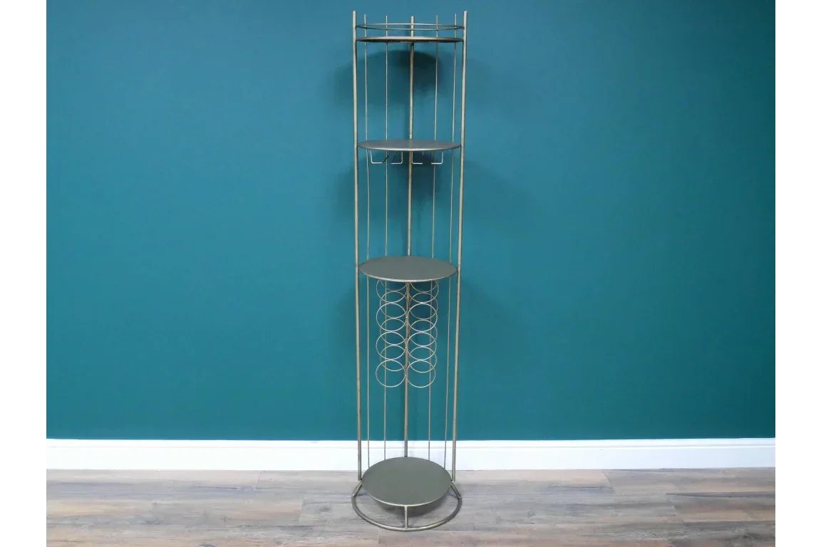 Gold metal wine rack with three shelves and bottle holders against teal wall
