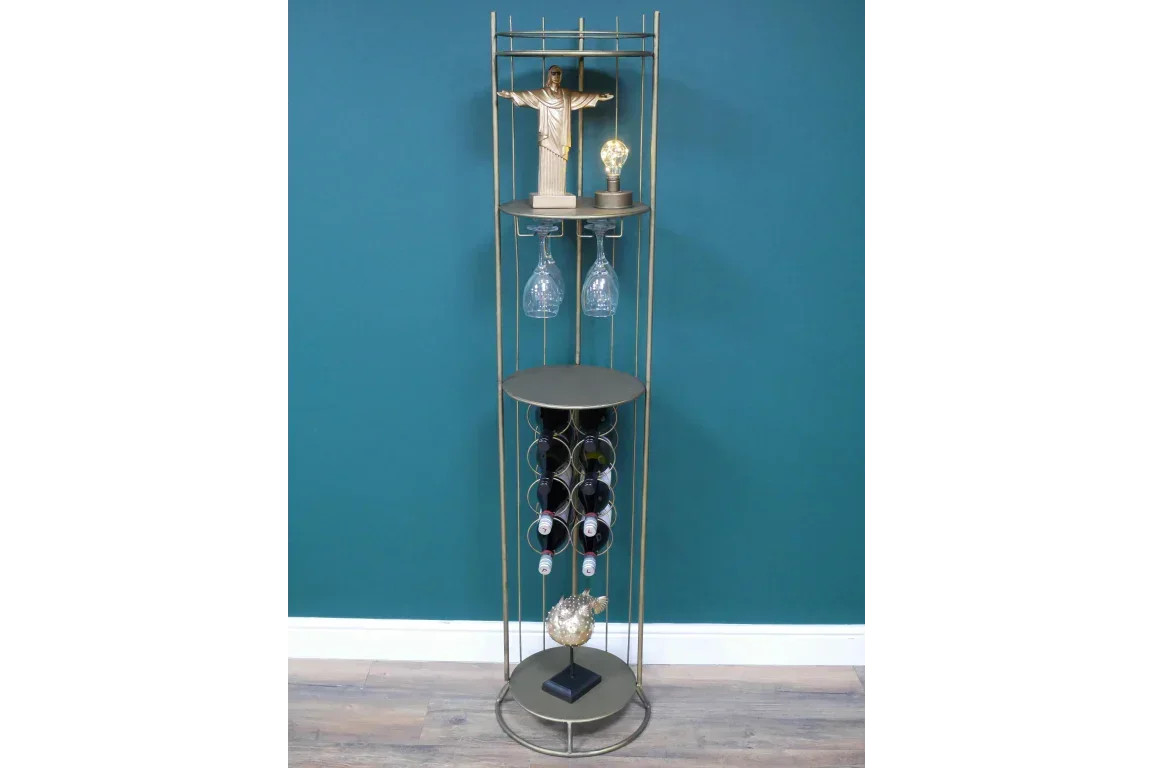 Gold metal wine rack with glass holders and shelves against teal wall