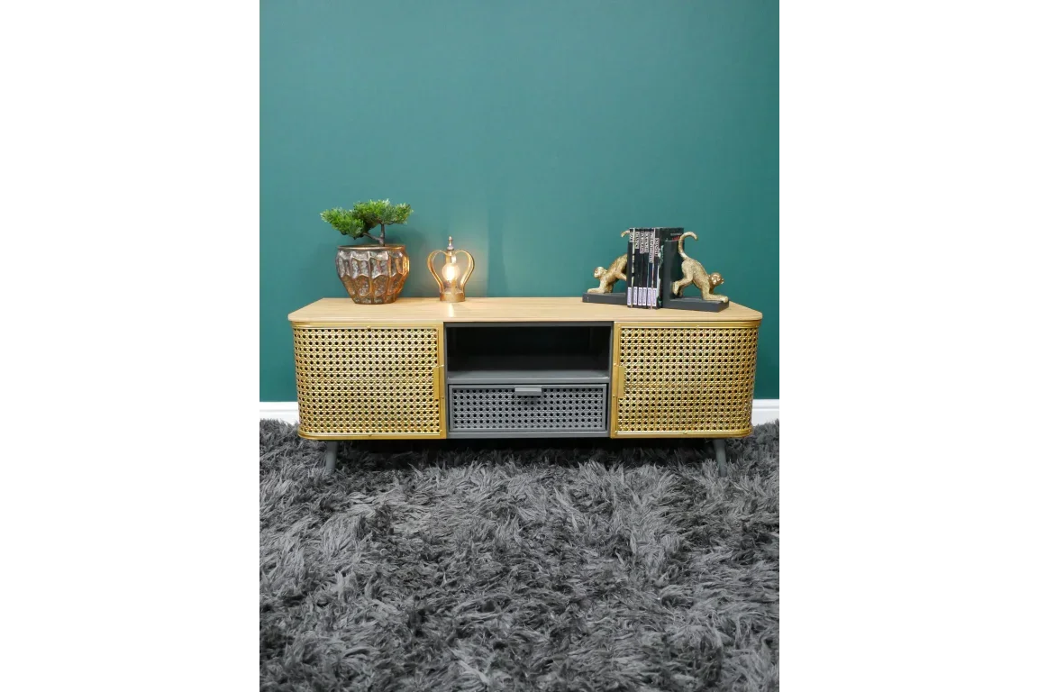 Rattan TV unit with cane doors, wooden top, and decorative accessories in modern living room