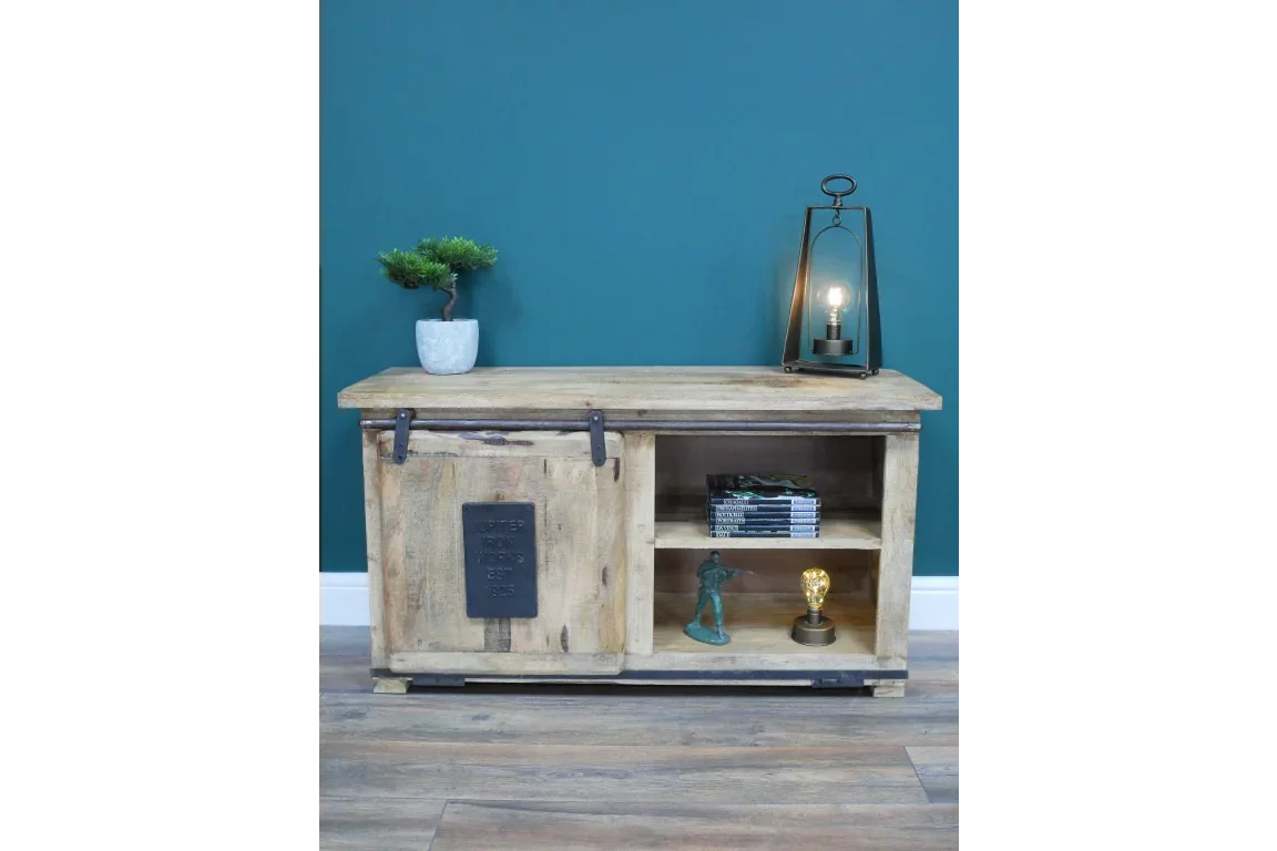 Rustic wooden sideboard with sliding barn door, open shelving, metal hardware, and decor accents
