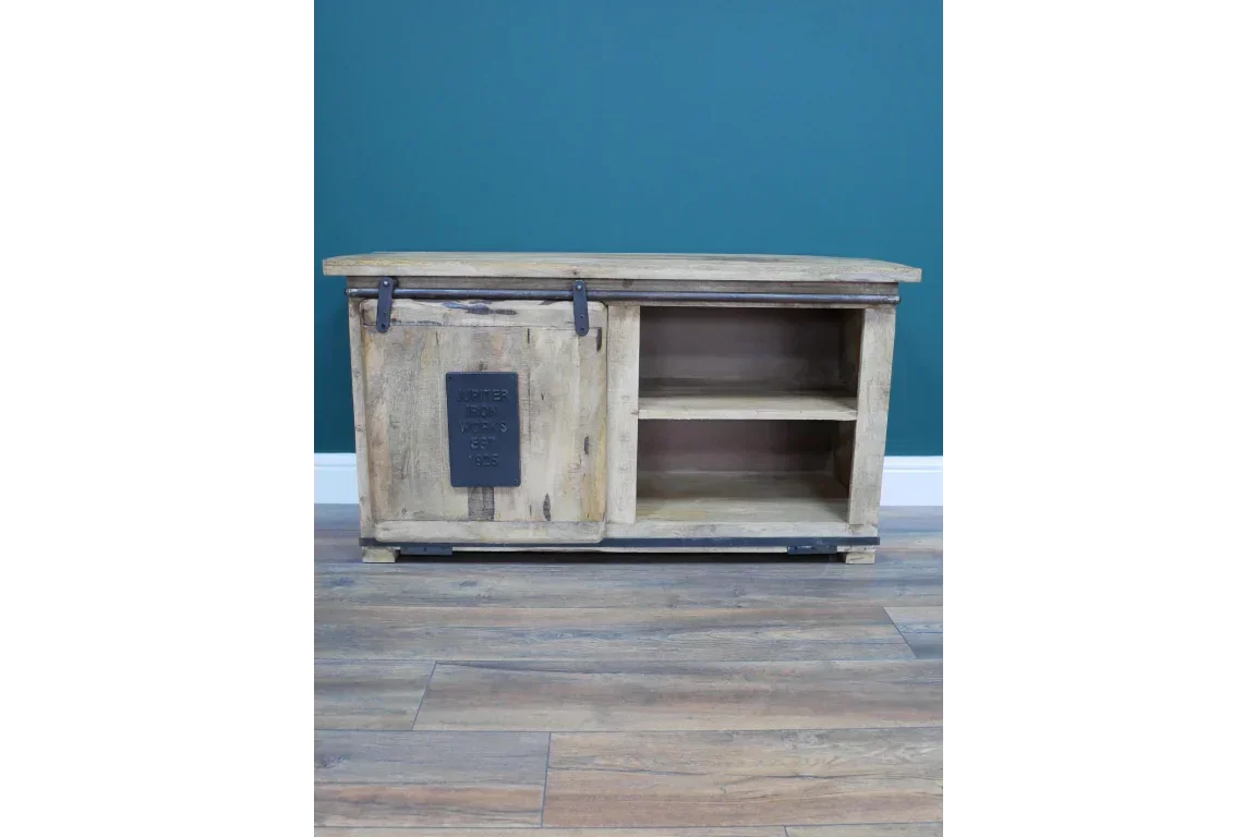 Rustic wooden TV unit with sliding barn door and open shelves on hardwood floor