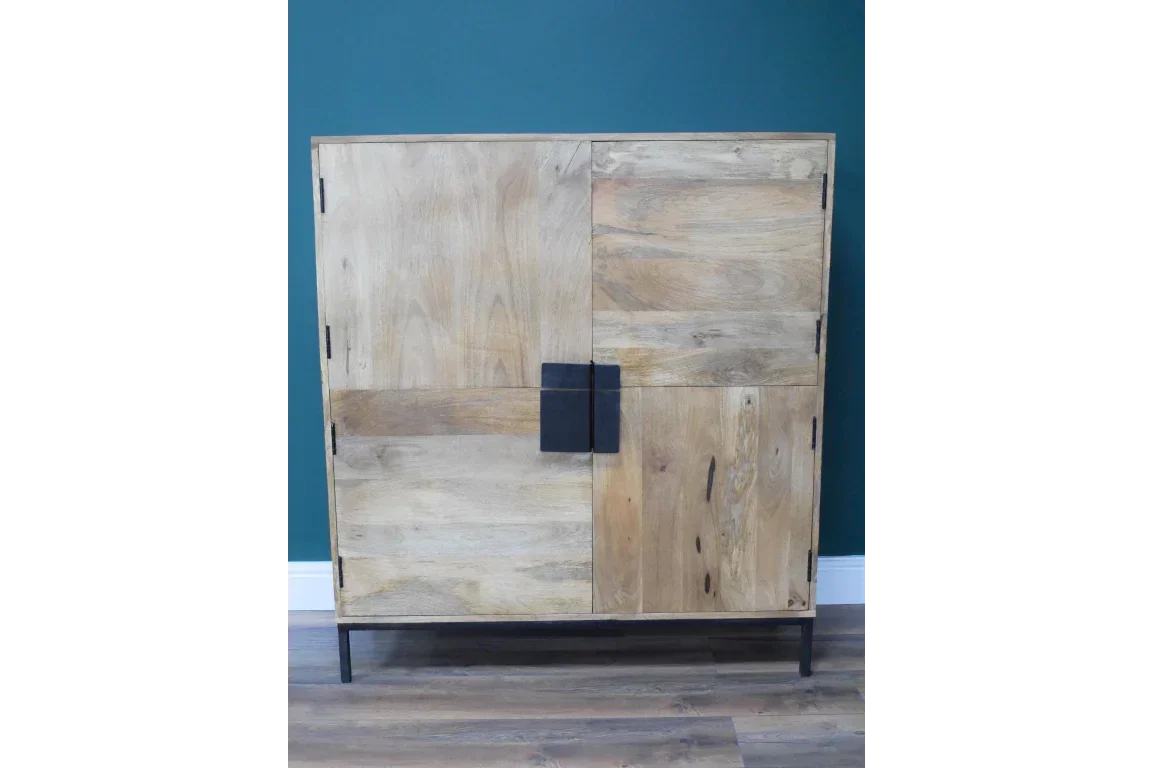Mango wood sideboard cabinet with black metal legs and handles against teal wall
